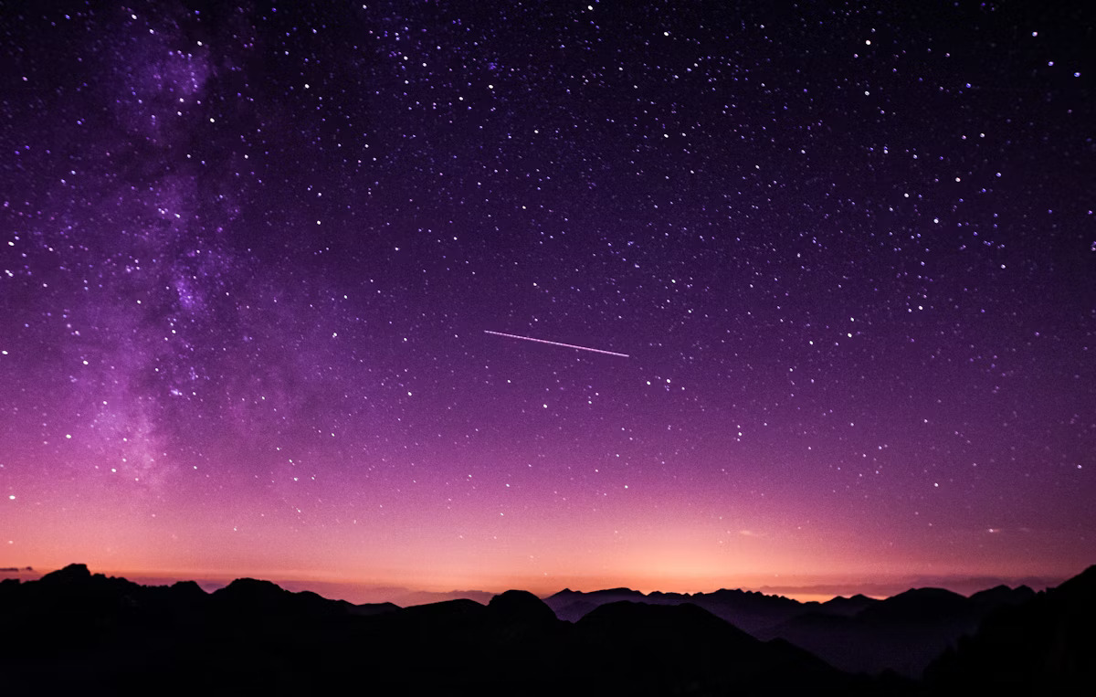 Starry cosmic sky representing celebrity astrology